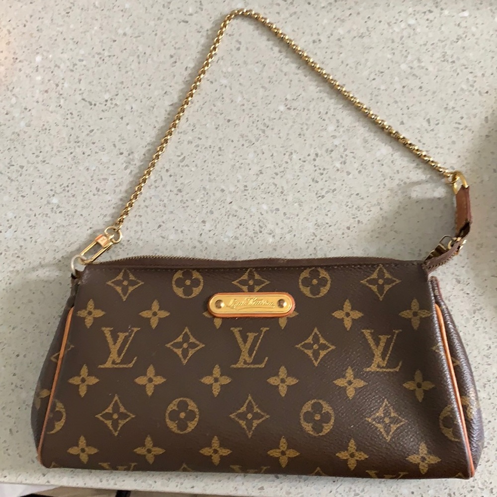Authentic Louis Vuitton Eva clutch handbag